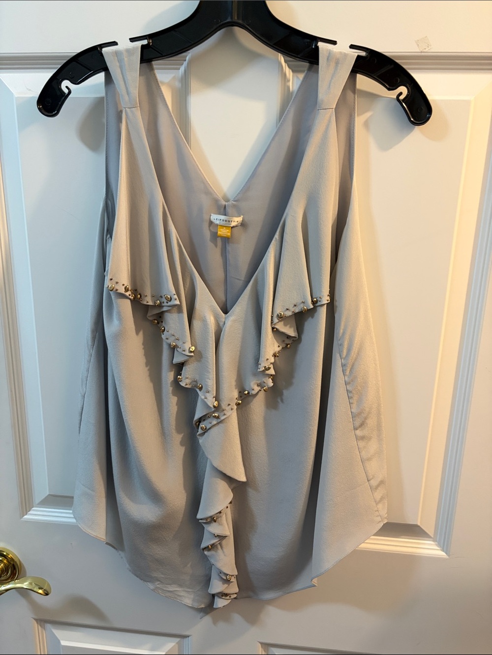 leifsdottir Sleeveless Ruffle V-Neck Top in Light Gray with Gold Studs
